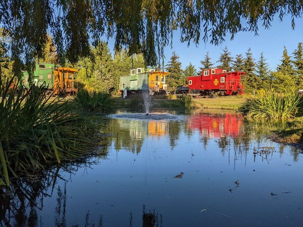 Reserve the entire property of 7 cabooses with a beautiful duck pond in the middle!