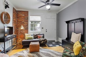 Remarkable renovation/restoration in this historic Victorian District. This one-bedroom apartment with private entrance is impeccably designed and decorated, with an outdoor deck!