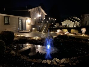 Evening view of back patio area. 