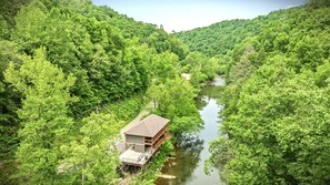 Welcome to Take Me to the River Cabin perched above the famous Little Pigeon River. Enjoy the serenity of nature. We offer 2 level of decks facing the river. This is what vacationing on a waterfront property is all about!