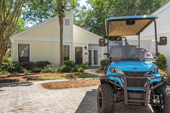 Outside and NEW 2024 6-seater cart