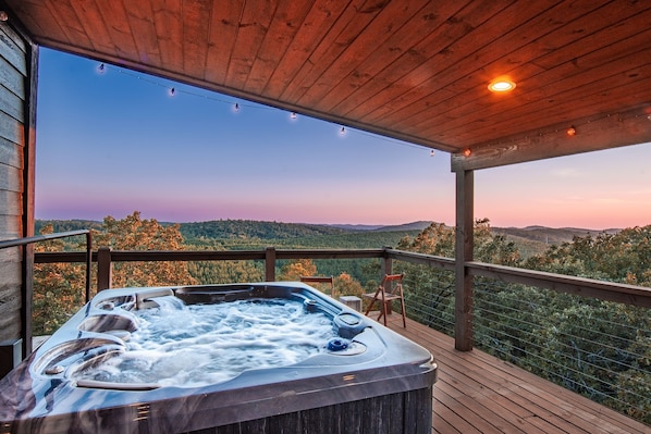 At the Legend of Broken Bow, relax and take in unbelievable mountain views from the hot tub on our amenity-filled double decks from a luxury, new build cabin!