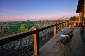Sip coffee or your favorite beverage from double decker porches and enjoy luxury amenities on our private, wooded lot.