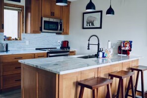 Newly-remodeled kitchen and breakfast bar.