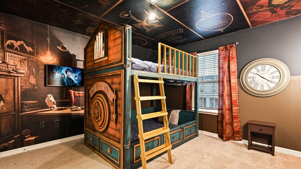 Children will enjoy staying in this Horry Potter themed bedroom.