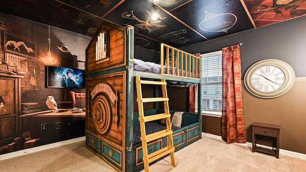 Children will enjoy staying in this Horry Potter themed bedroom.