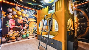 Kids will love this themed room with Minions painting.