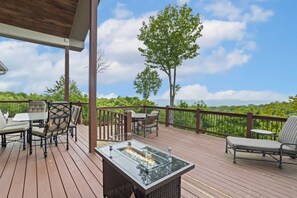 Spacious Main Level Deck Overlooking the Blue Ridge Mountains with a Gas Fire Table