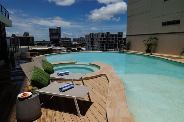 Large pool in complex with city views
