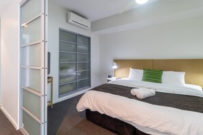 Comfy king size bed in separate bedroom