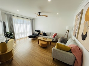 Living room capturing the afternoon sun with an abundance of natural light