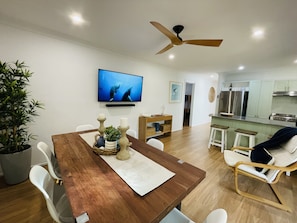 Gather around the dining table. Sony 55inch 4K UltraHD Smart TV and Soundbar