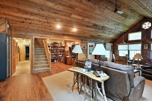 Living Room with vaulted ceilings and open concept give a spacious feel to the Cabin.