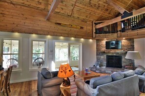 High vaulted ceilings and lakeside views abound.