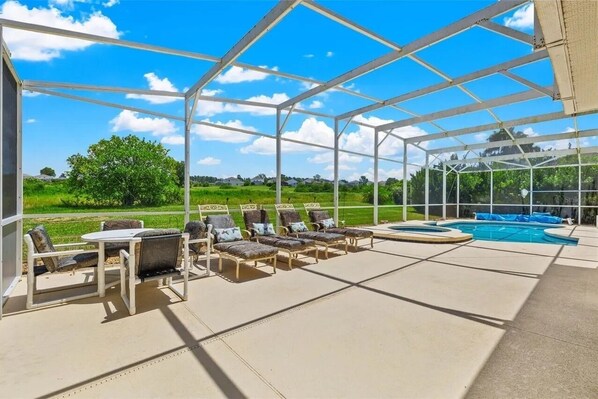 Large extended pool deck with plenty of sun loungers
