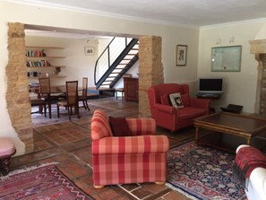 Living room, looking towards dining room and stairs