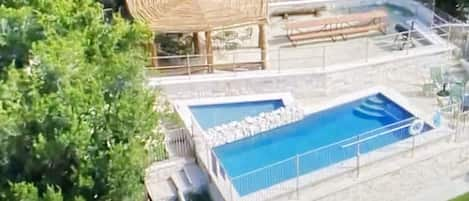 Hillside - Beautiful poolside with excellent entertainment area.