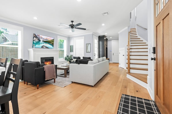Enter the front door to find a clean and stylish living space for your stay