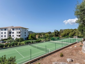 Sky, Plant, Property, Cloud, Building, Window, Land Lot, Tree, Tennis, Grass
