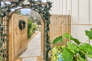 Walk through this gate into the private and peaceful backyard