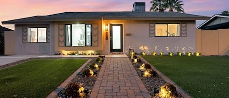 Front of the house with walkway lighting