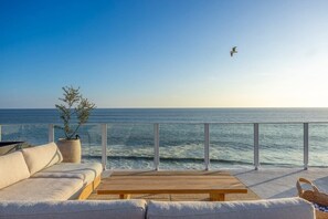 Revel in ocean panoramas on the expansive deck—an outdoor escape with a view.