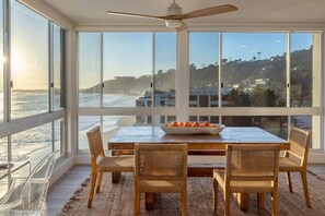 Captivate your senses in the dining room, an exquisite space for shared moments and ocean views.