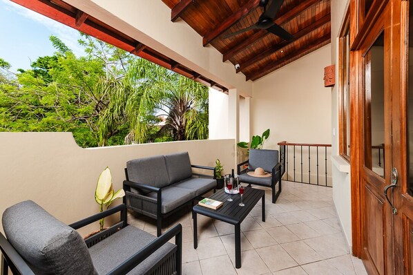 The unit has a nice little outdoor porch, perfect for a sunset drink in the afternoons!