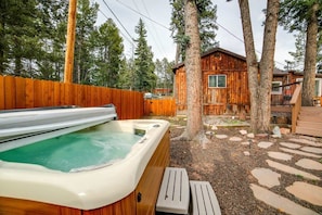Private hot tub in backyard.
