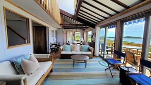 Living room with dining area beyond