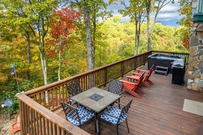 Front Porch - Front porch with gas grill, outdoor dining, and a hot tub