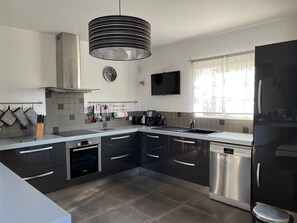 Very spacious, fully equipped kitchen.