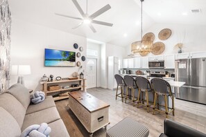 Open concept kitchen, living, and dining area