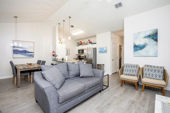 Living area with comfortable seating and flat screen TV