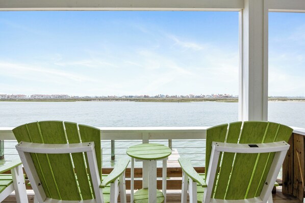 Enjoy breathtaking water views on on either one of the two private waterfront balconies