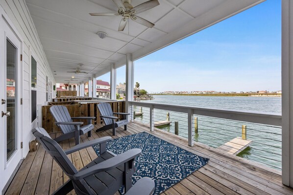 Enjoy breathtaking water views from the living area private balcony
