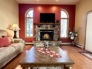 Looking at fireplace & TV