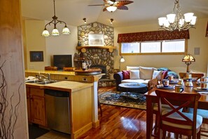 Walking out of master bed into the kitchen and living room