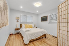 guest bedroom with queen bed