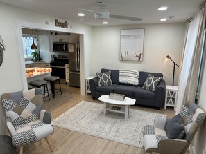 living room with room darkening curtains
