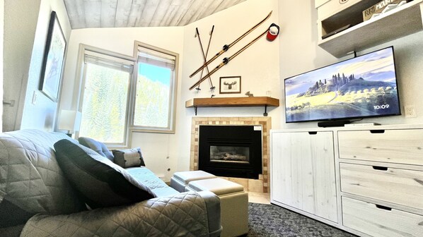 Bright space with top to bottom views of the alpine forest on The Corridor.