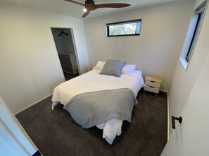 Master bedroom 1 with walk through wardrobe in ensuite. King bed
