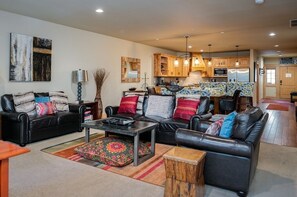 Watch movies, tell your adventure stories, or just hang out in the large living area with multiple comfortable couches