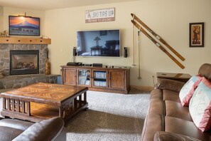 Living Room with Gas Fireplace and 72 TV