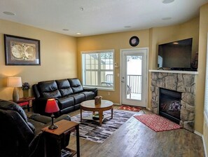 Hang out and watch a movie or relax by the fireplace in the living room