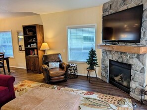 Reading chair, flat screen TV, and more to keep you entertained while you relax.