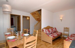 Sink into the cozy sofa after a day exploring the area.
