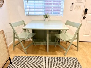 Expandable table to fit 4 people (extra chairs in closet)