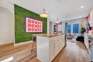 Discover this vibrant Nashville oasis, blending modern elegance with playful decor! Perfect for bachelorette parties or family reunions, this chic space features a stylish open kitchen and is just moments from Downtown. Your luxury getaway awaits!