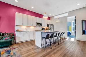 Welcome to your chic Nashville getaway! This stylish vacation rental boasts a vibrant kitchen great for gatherings, upscale decor, and modern amenities. Perfect for an unforgettable bachelorette party or family reunion!